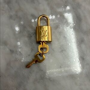 Louis Vuitton Gold Padlock and Key Set